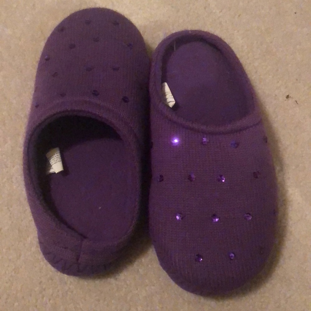 Purple house shoes.
